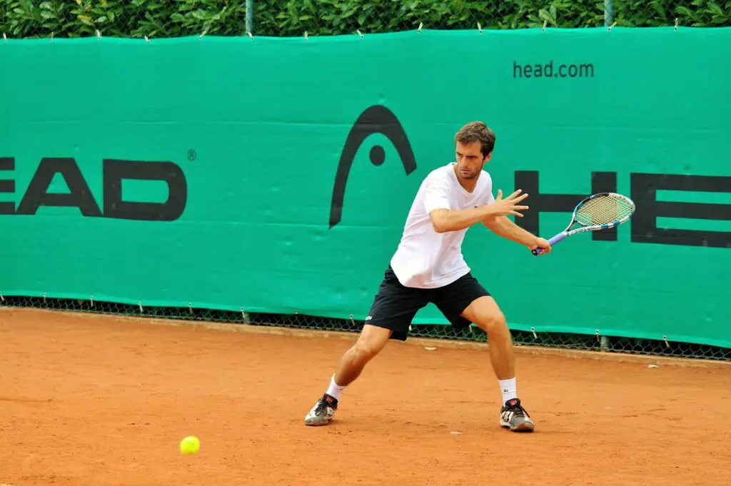 Playing tennis on clay