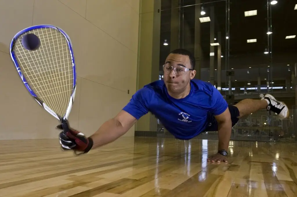 Playing racquetball 