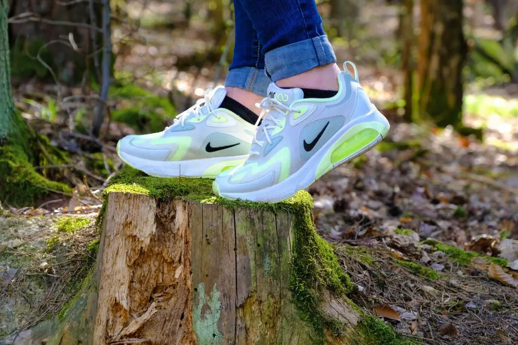 Walking with sneakers in the forest
