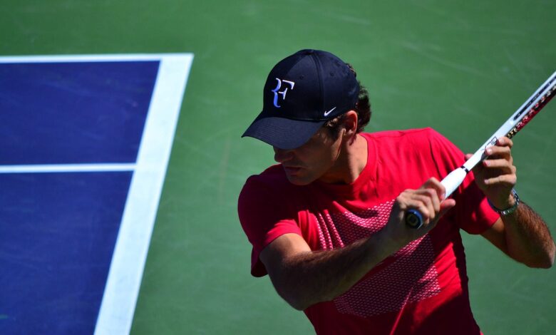 Federer playing tennis